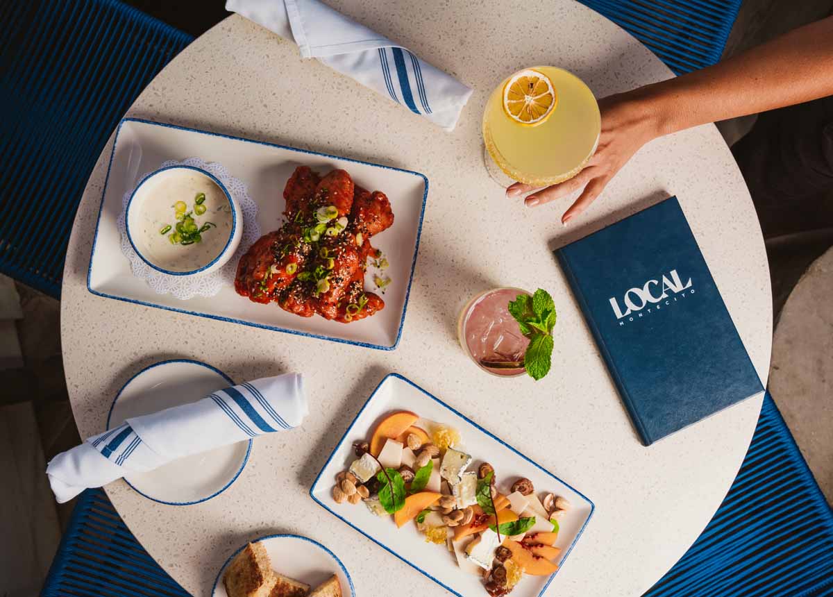 A colorful spread of dishes and cocktails at LOCAL Montecito